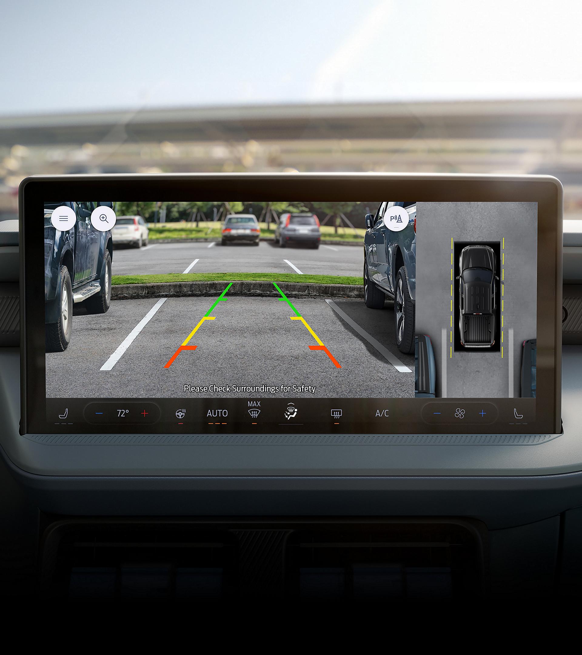 Close-up of the 13.2" centre display showing reverse camera view