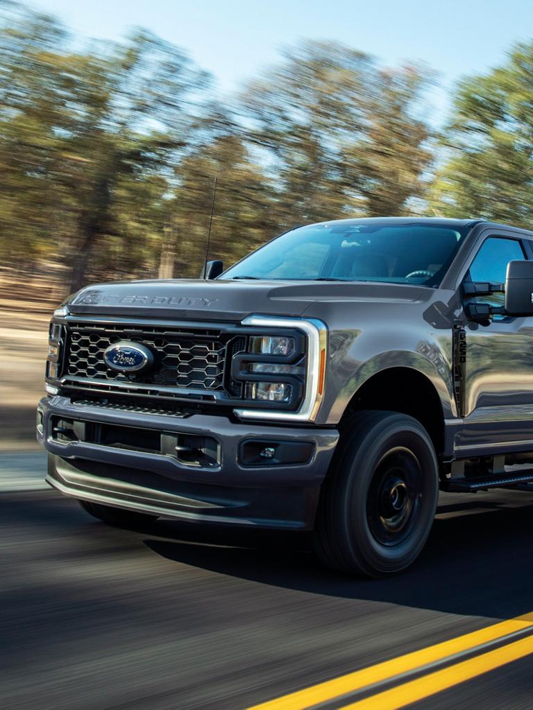 2026 Ford Super Duty® F-250® XL model with the STX® Appearance Package being driven on a paved road