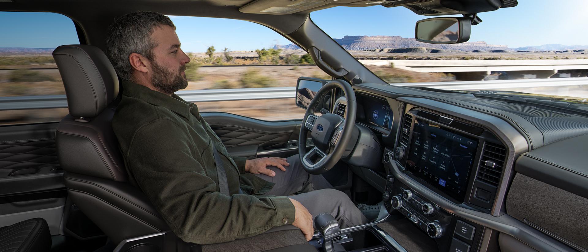 Man using the BlueCruise hands-free highway driving feature