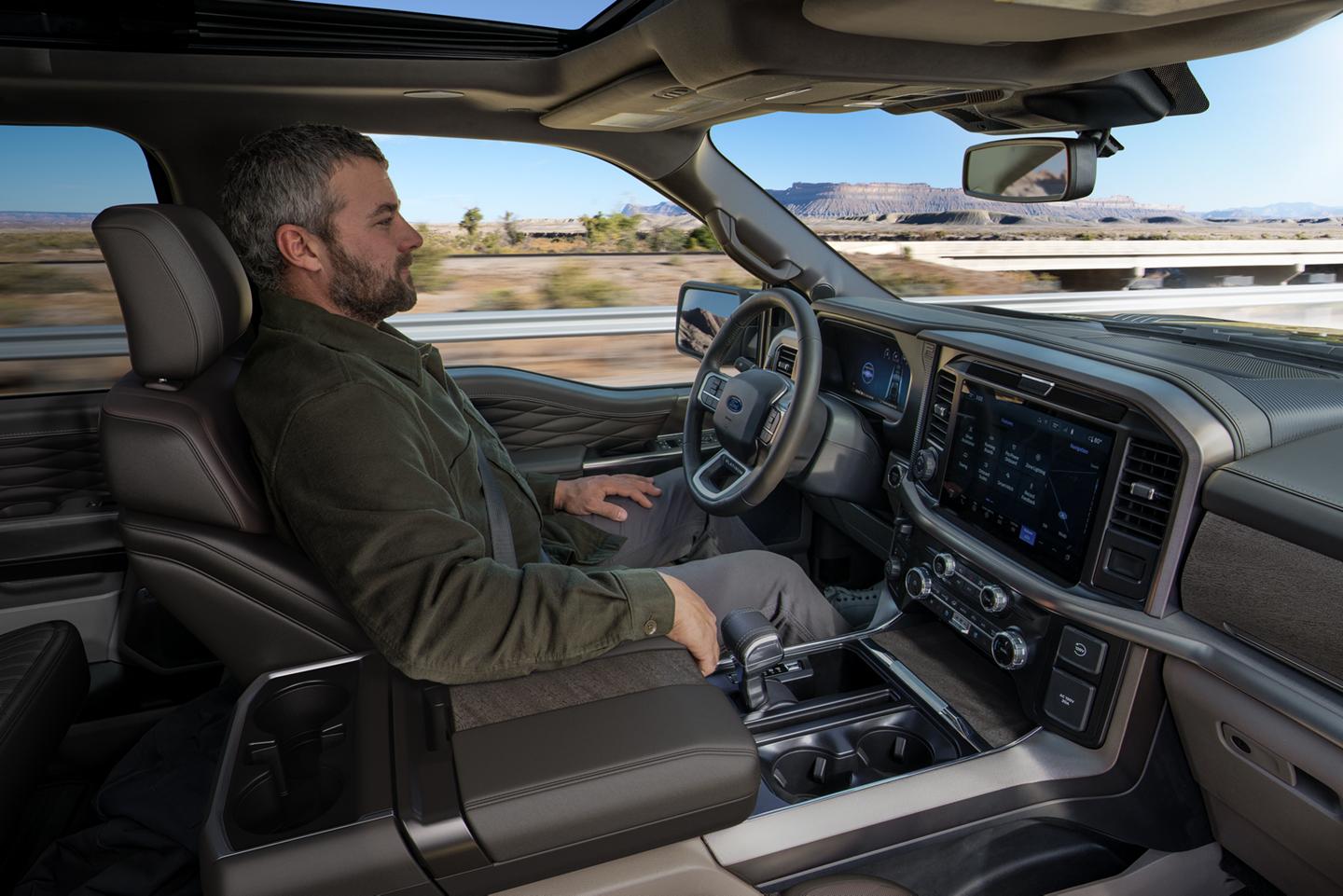 Man using the BlueCruise hands-free highway driving feature
