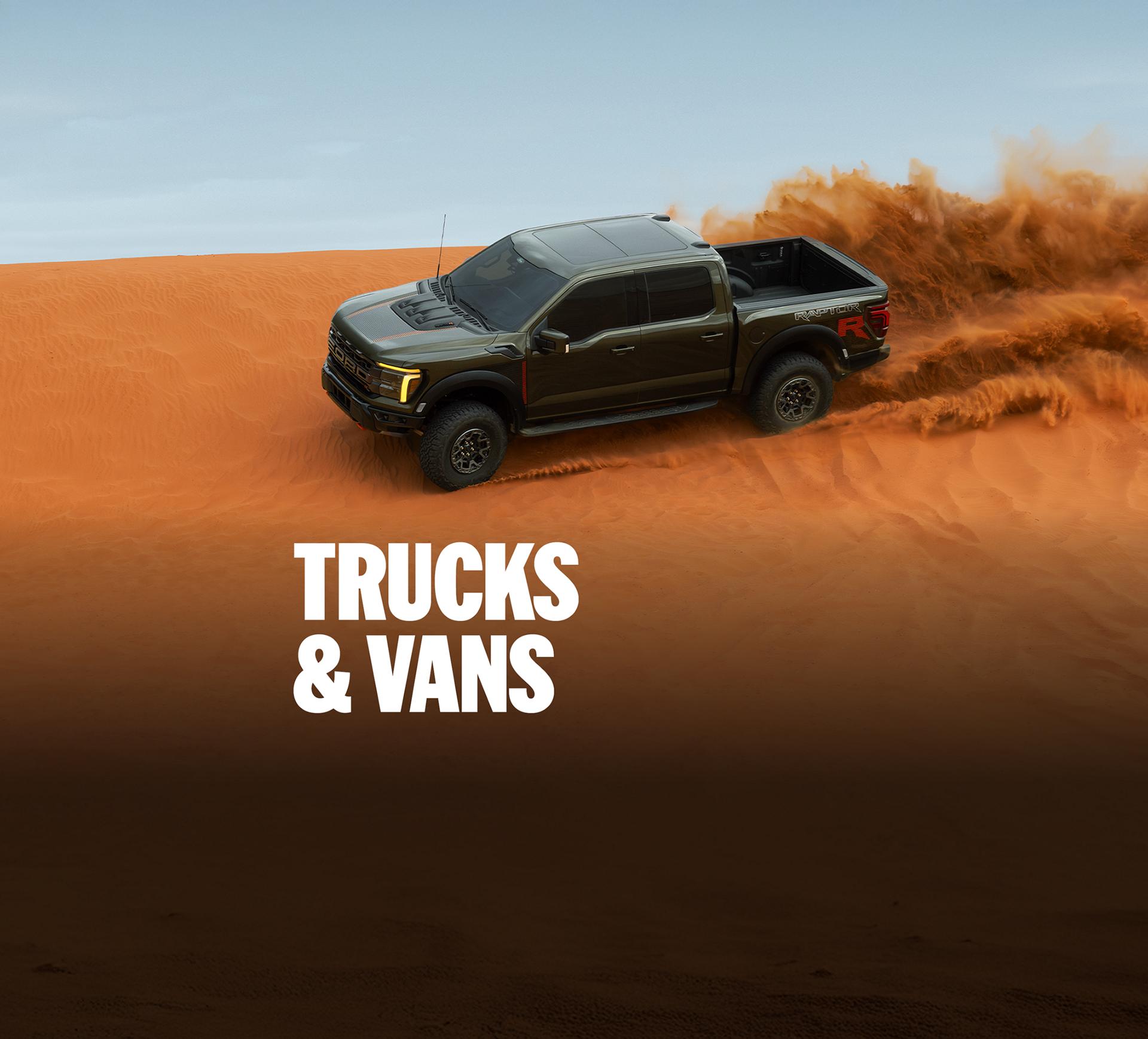 Ford trucks and vans driving on varying terrain. “Trucks and Vans”.