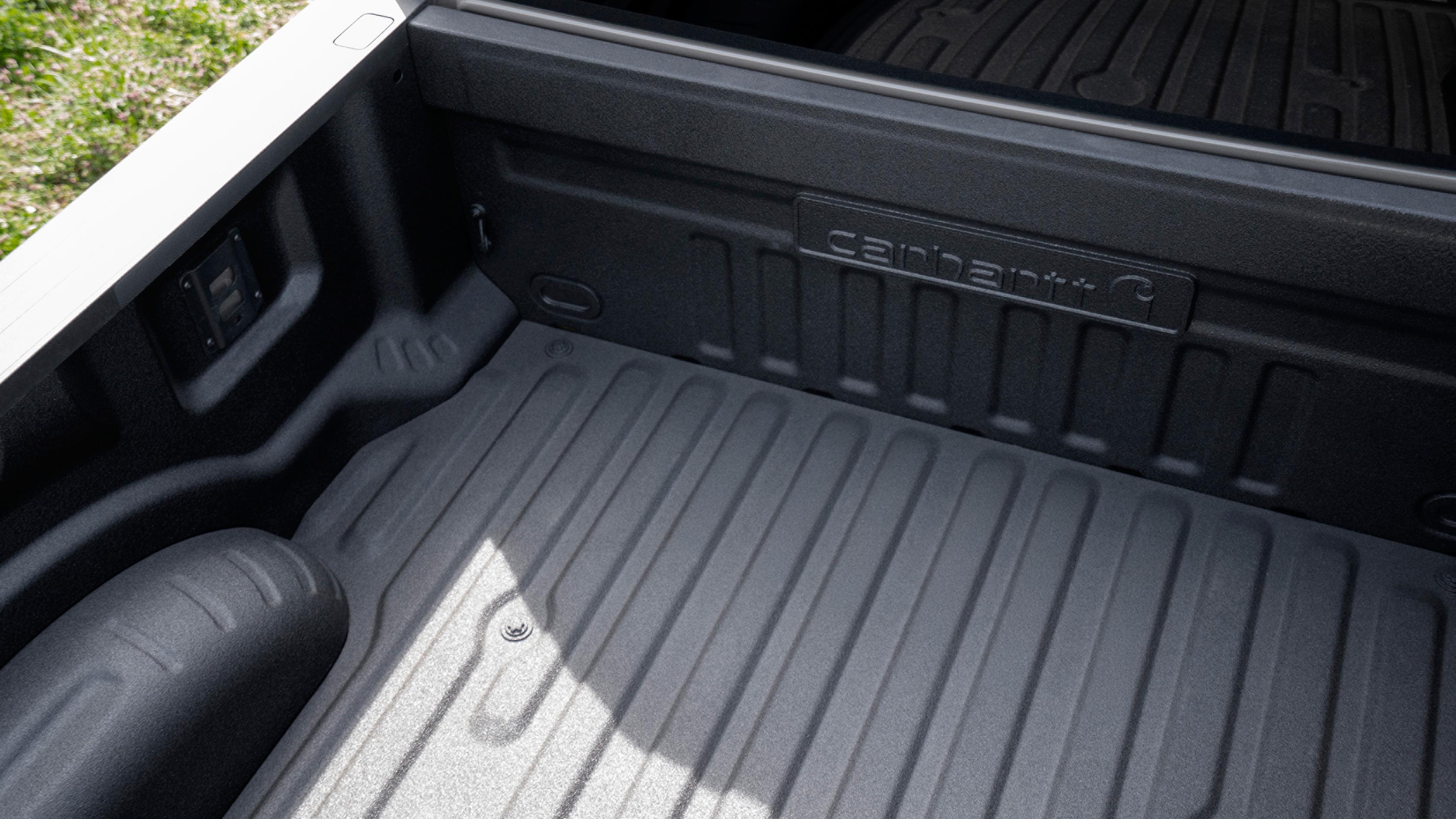 Inside view of the truck bed on the 2027 Ford Super Duty® F-350® XLT model with the Super Duty Carhartt® Package
