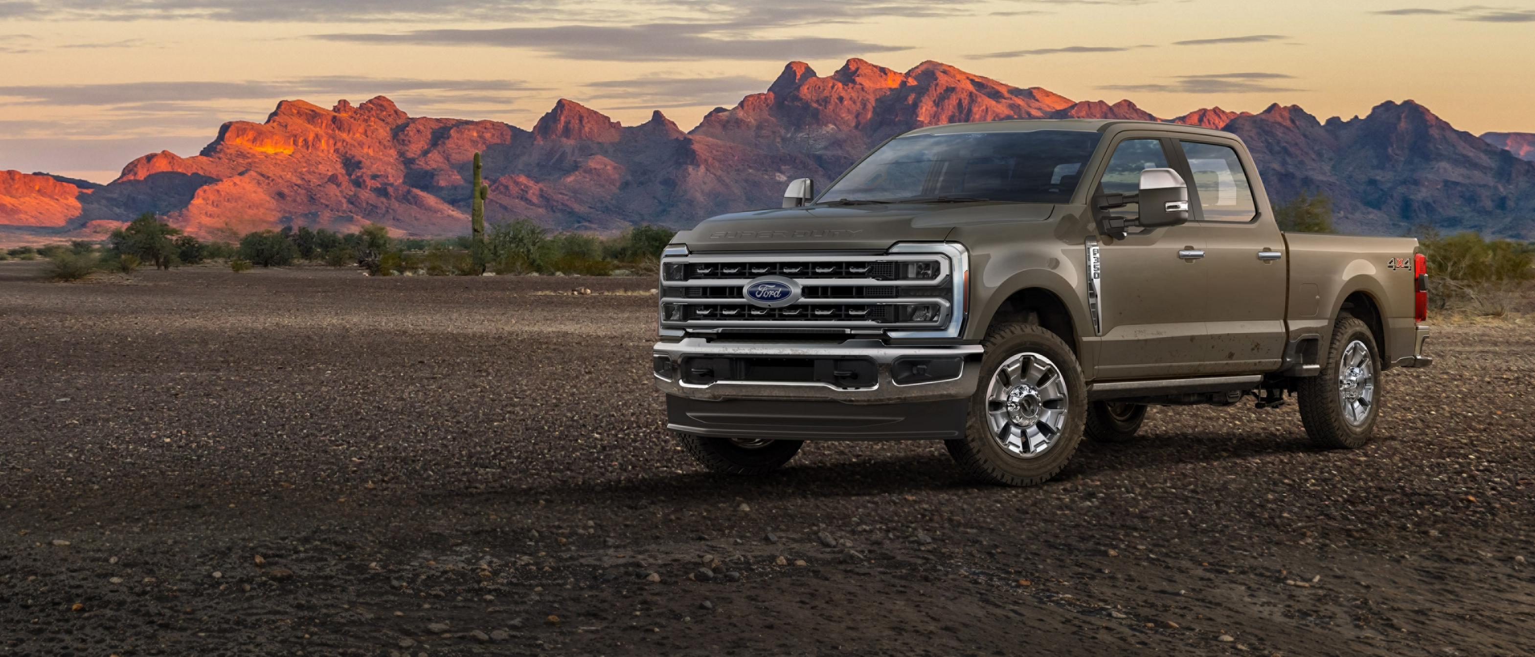 2026 Ford Super Duty® F-350® King Ranch® model parked on gravel with mountains in the background