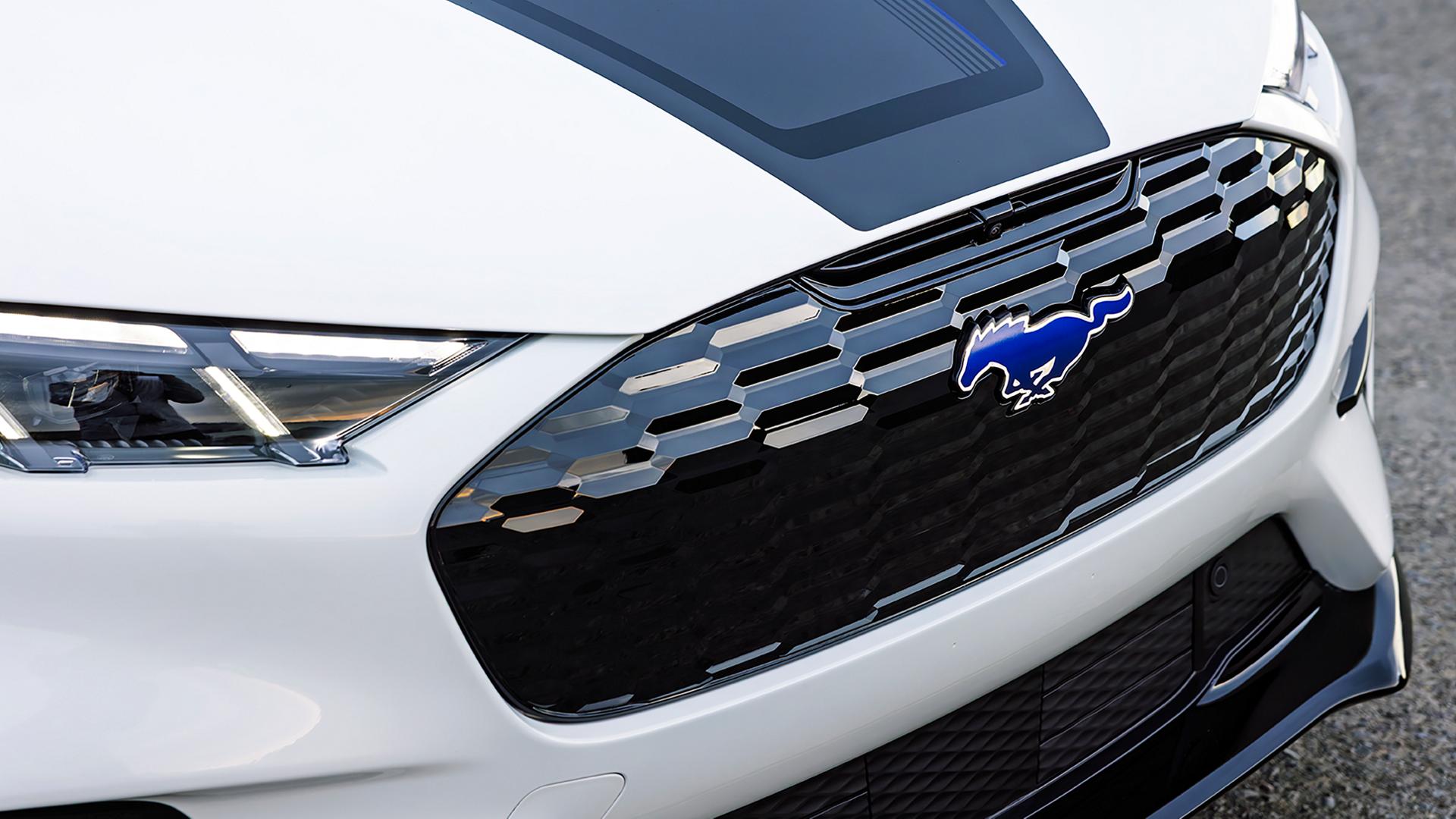 Rave-Blue Pony badge and hood stripe of the California Special Package on the U.S. 2026 Ford Mustang Mach-E® SUV