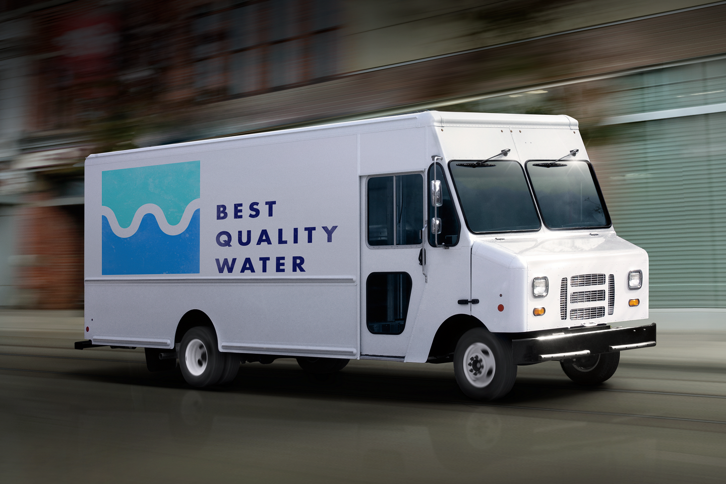 A box body on a 2026 Ford E-Series Stripped Chassis, driving down an industrial street