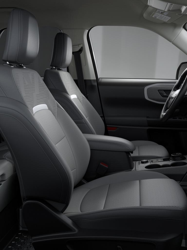 Interior of the 2026 Ford Bronco Sport® Badlands SUV in Dark Space Grey leather-trimmed seats