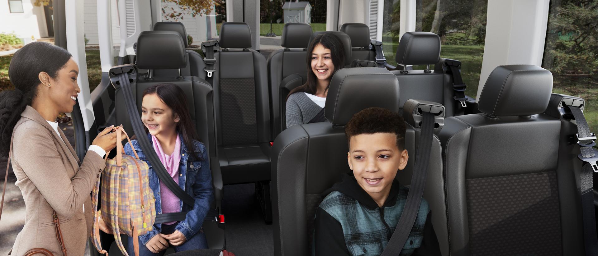 Interior view of adult adjusting seat belts for three children