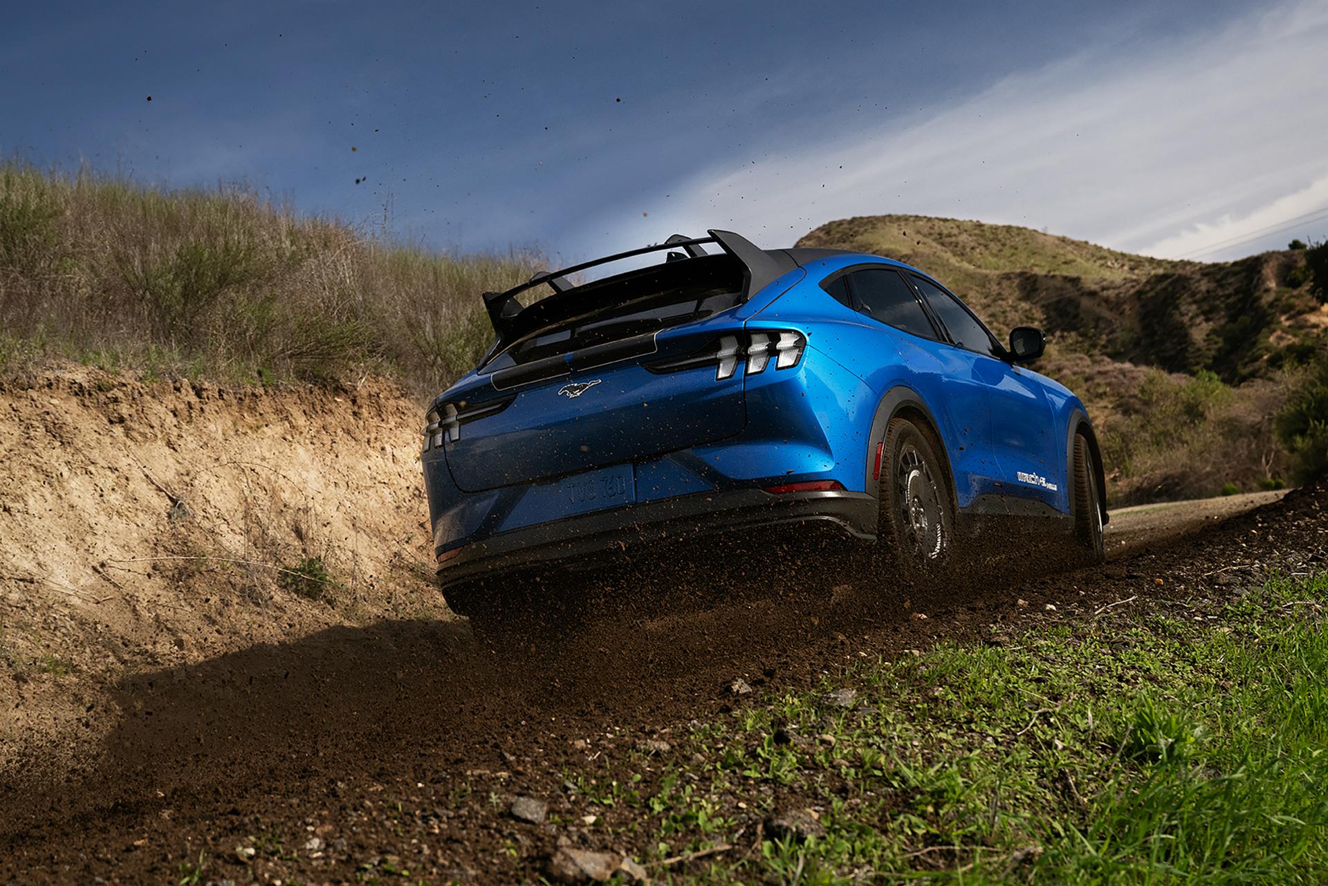 2025 Ford Mustang Mach-E® Rally vehicles on dirt road