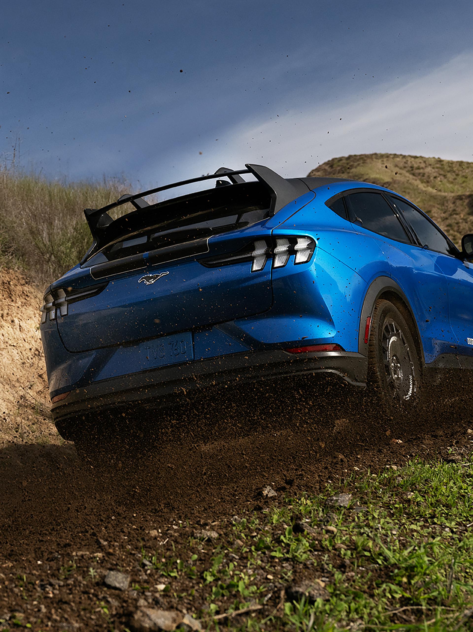 2025 Ford Mustang Mach-E® Rally vehicles on dirt road