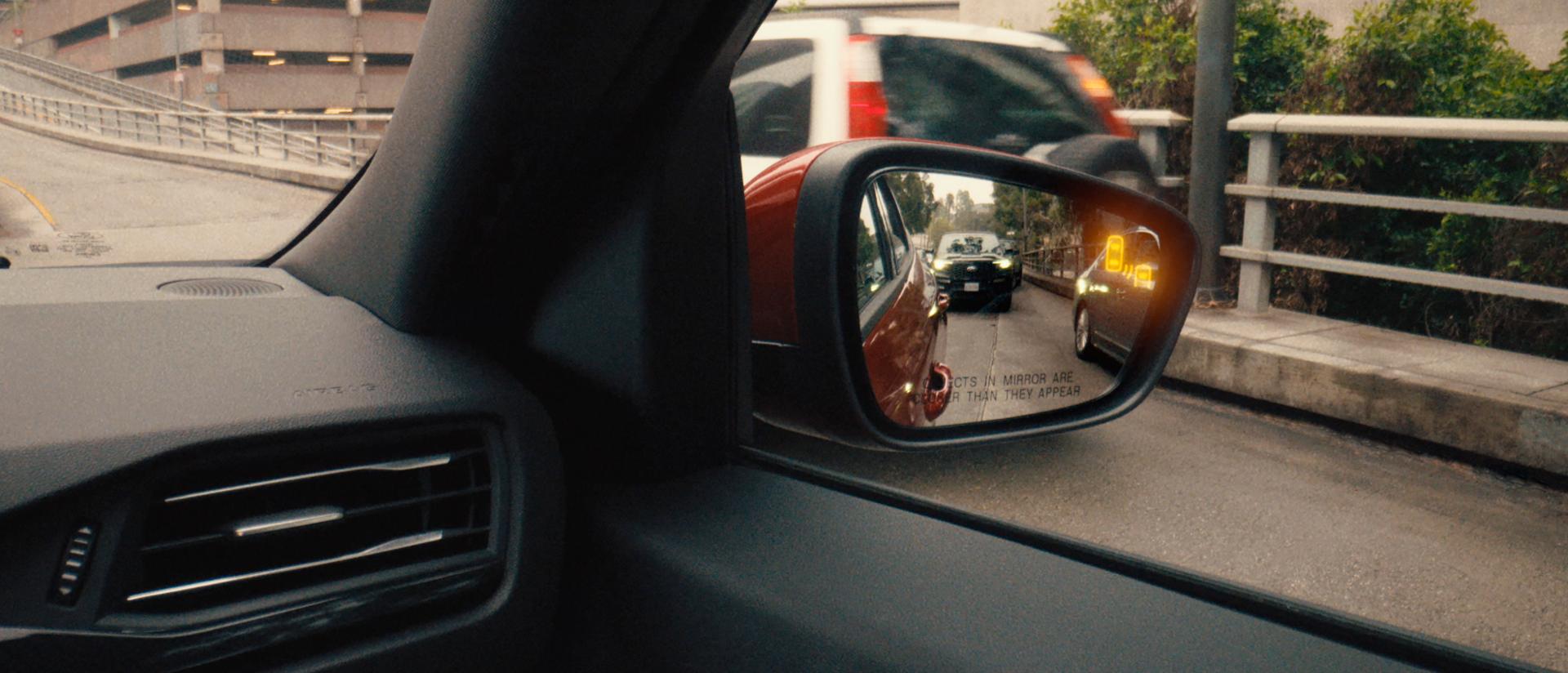 Close-up of the sideview mirror of a 2026 Ford Escape® SUV