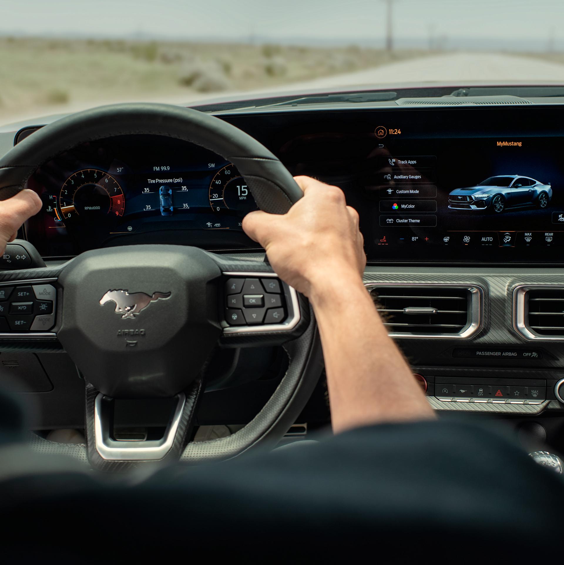 Person driving a 2026 Ford Mustang® fastback