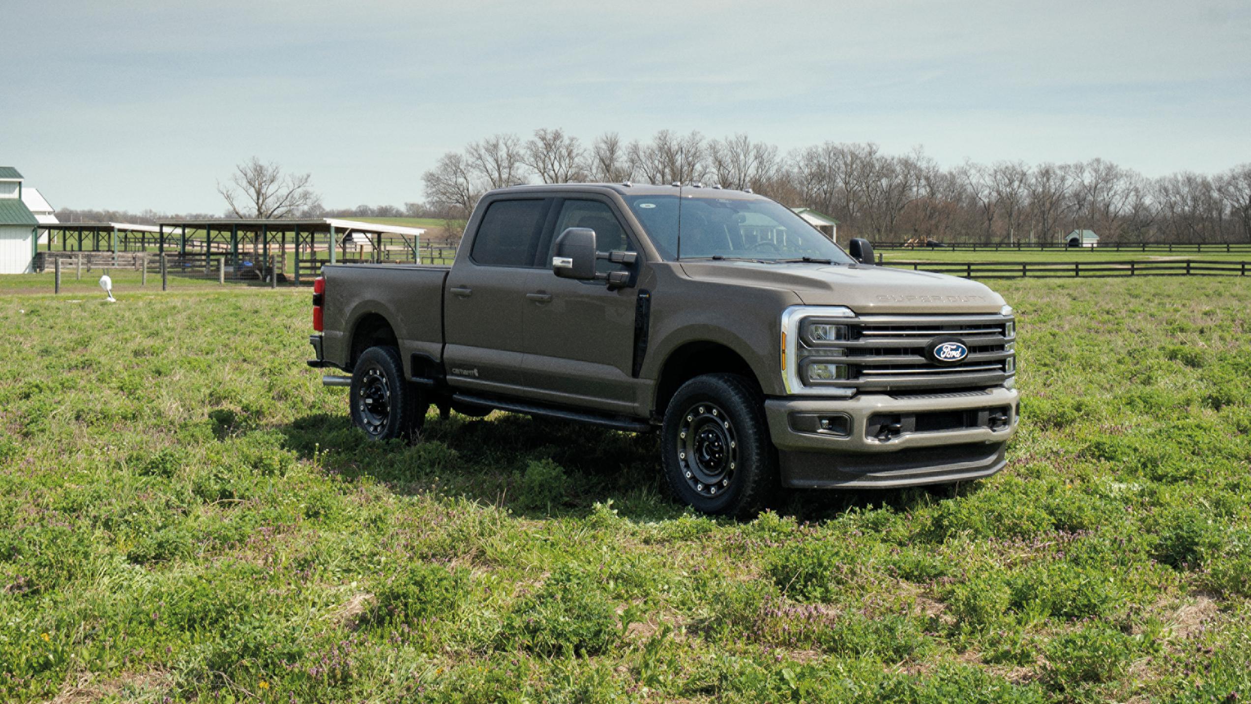 2027 Ford Super Duty® F-250® XLT model with the Super Duty Carhartt® Package parked in a grassy field