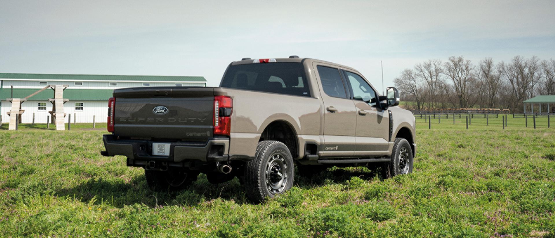 2027 Ford Super Duty® F-250® XLT model parked on a grassy farm