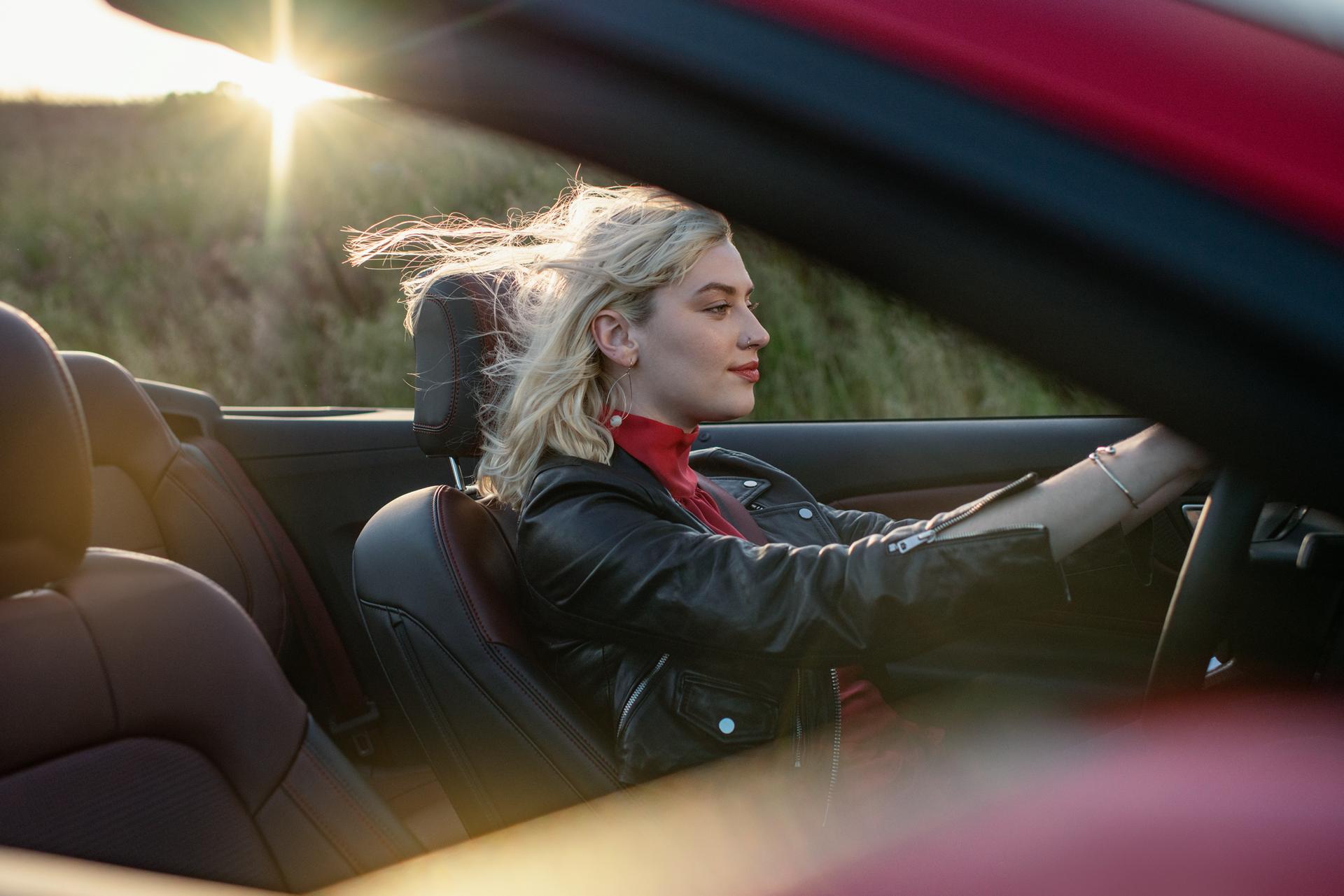 Person driving a 2025 Ford Mustang® convertible