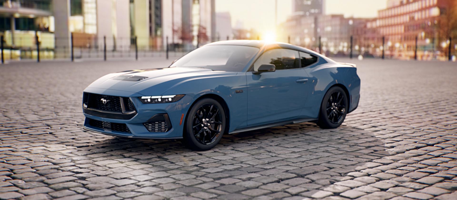 A 2026 Ford Mustang® GT Premium fastback parked in a downtown plaza