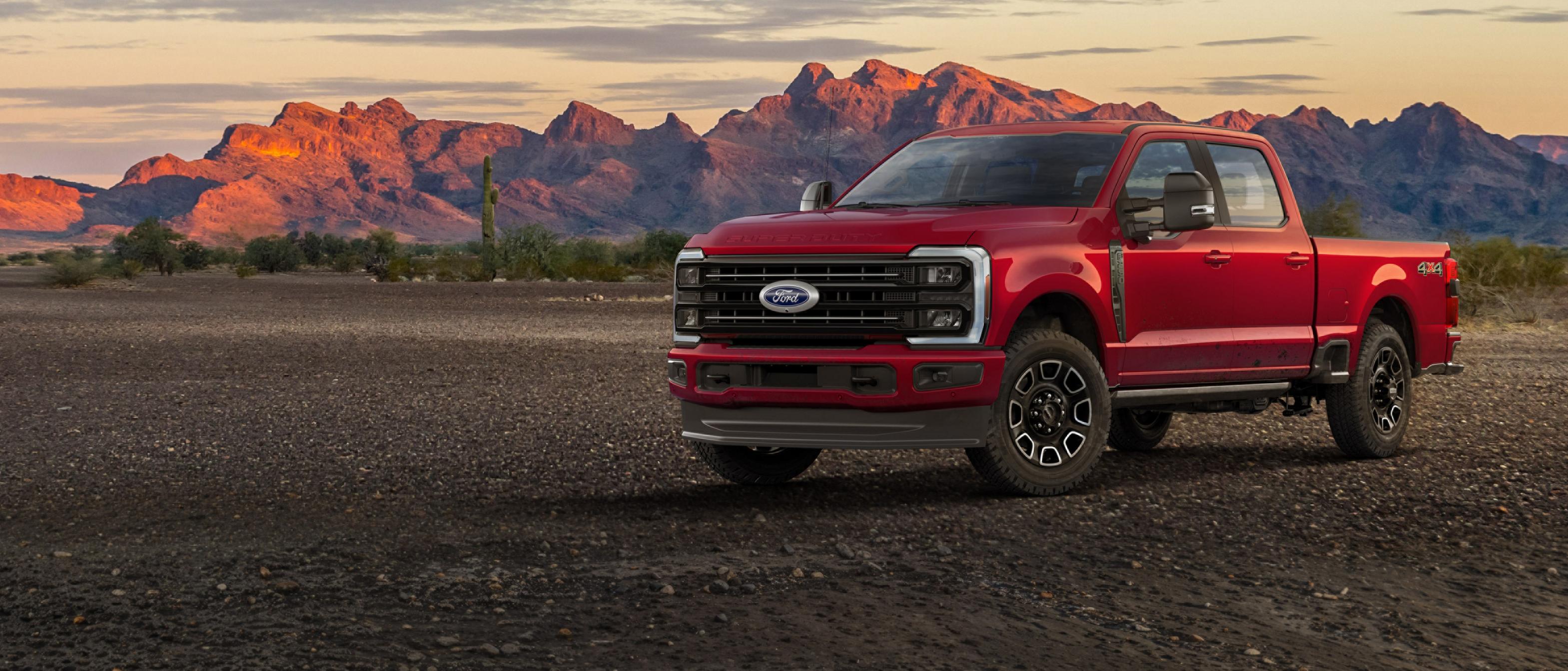 2026 Ford Super Duty® F-250® Platinum™ truck parked on gravel with mountains in the background