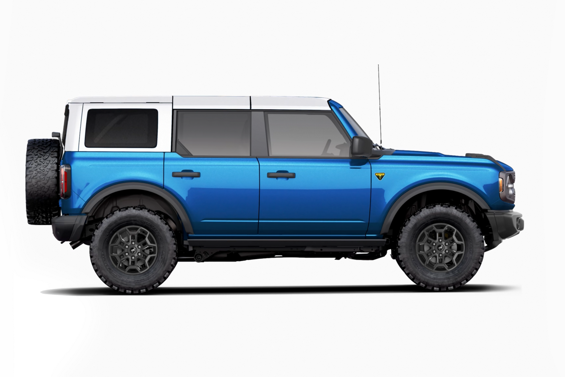 A 2026 Ford Bronco® Badlands in Ruby Red Metallic with an Avalanche Grey-painted roof