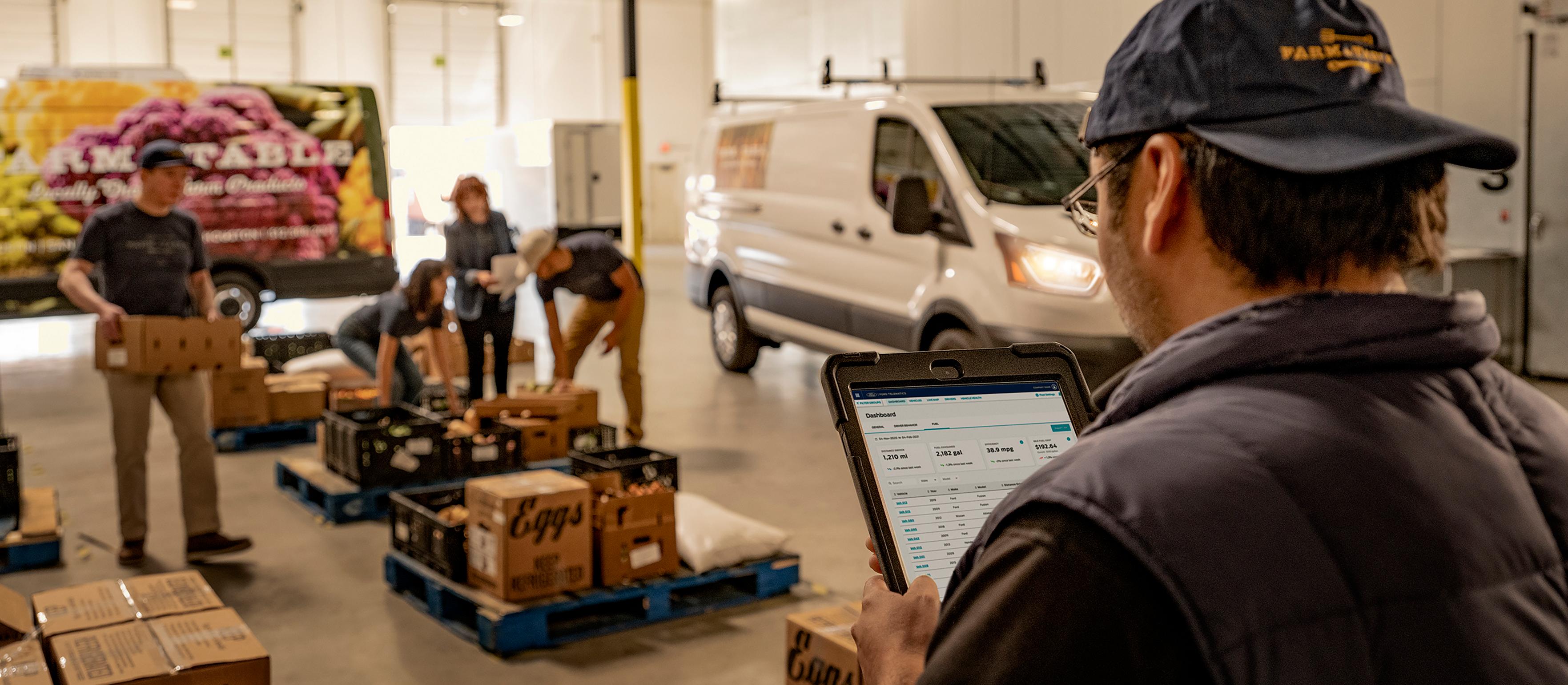 A crew of workers utilizing Ford Pro™ support and services