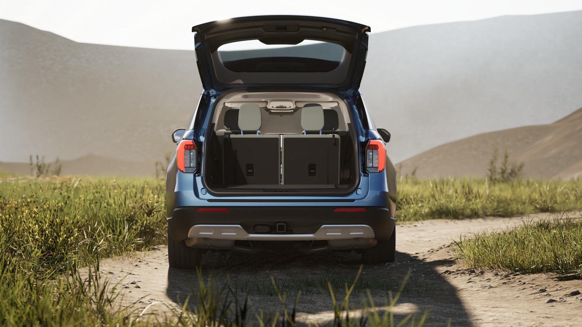 The rear of 2026 Ford Explorer® SUV with the power liftgate open