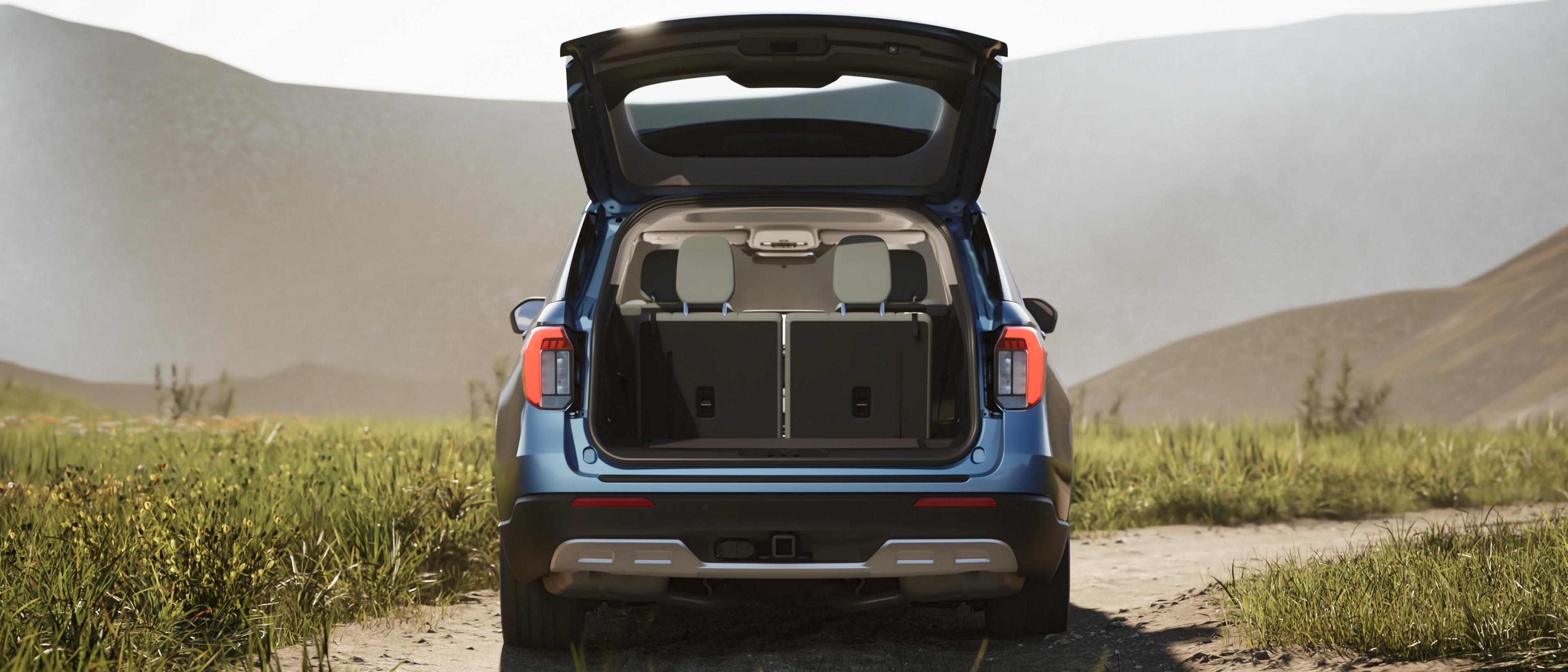 The rear of 2026 Ford Explorer® SUV with the power liftgate open