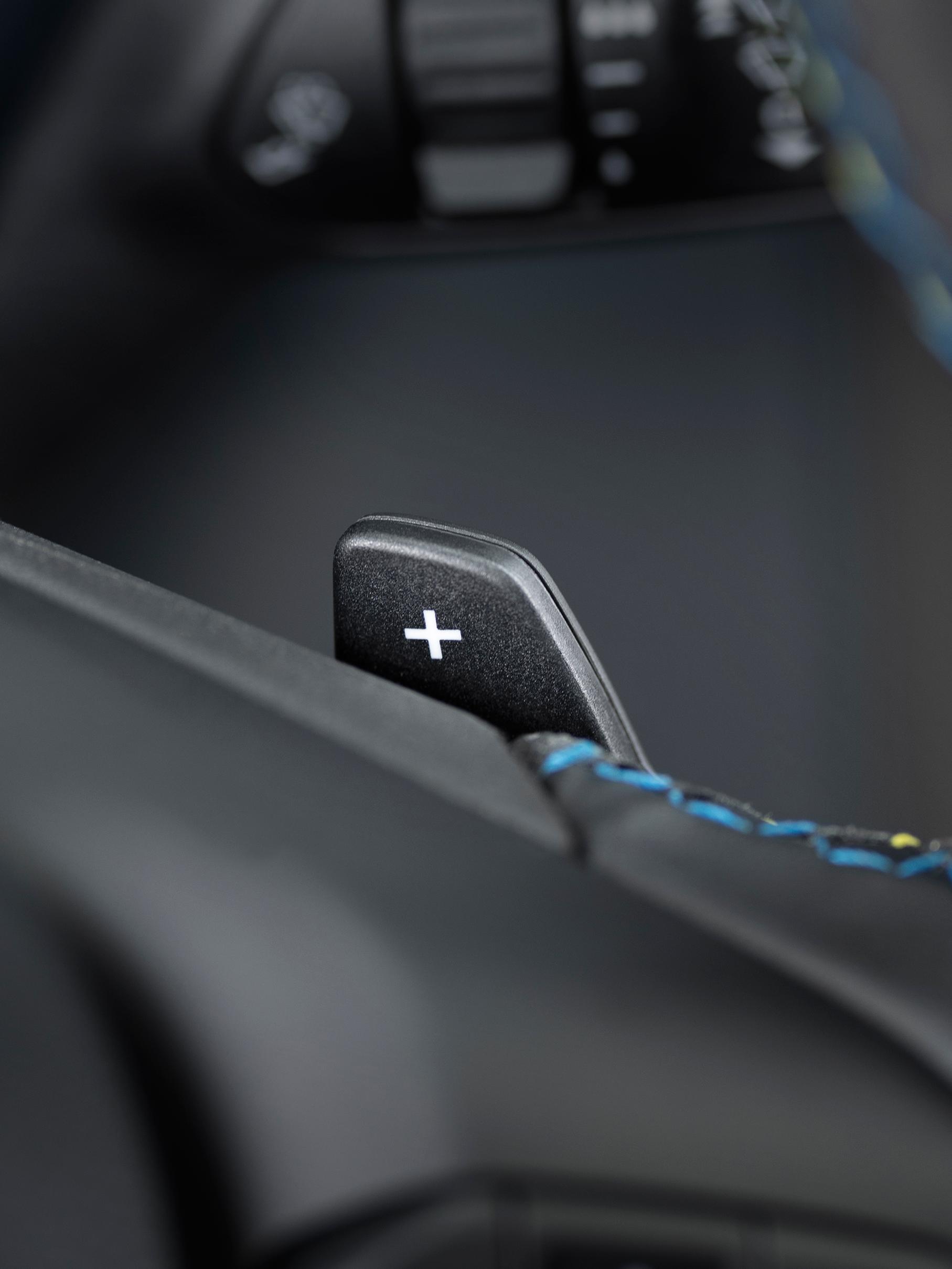 The steering wheel shift paddle and stitching on a 2026 Ford Maverick Lobo™ pickup