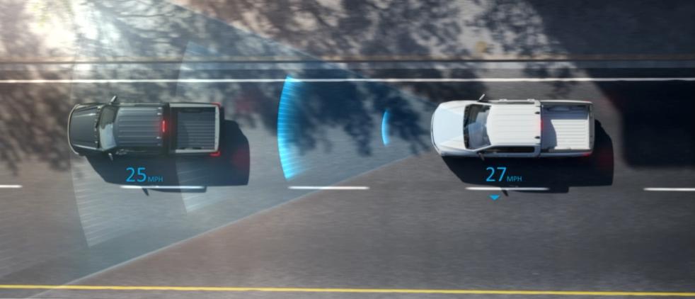 An aerial view demonstration of two 2025 Ford F-150® Lightning® pickups engaged with the Adaptive Cruise Control feature