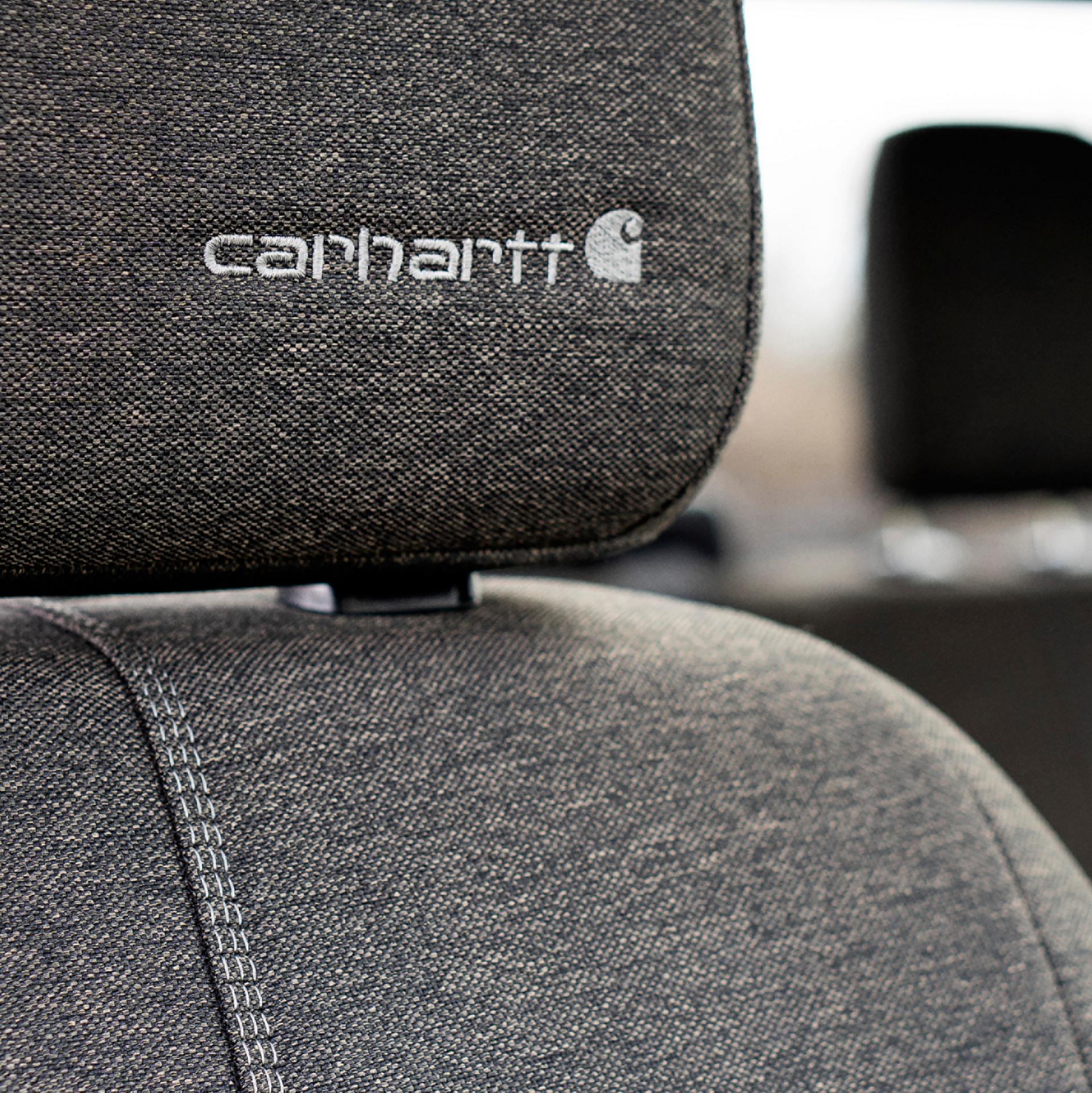 Close-up of passenger seat headrest with embroidered Carhartt® logo