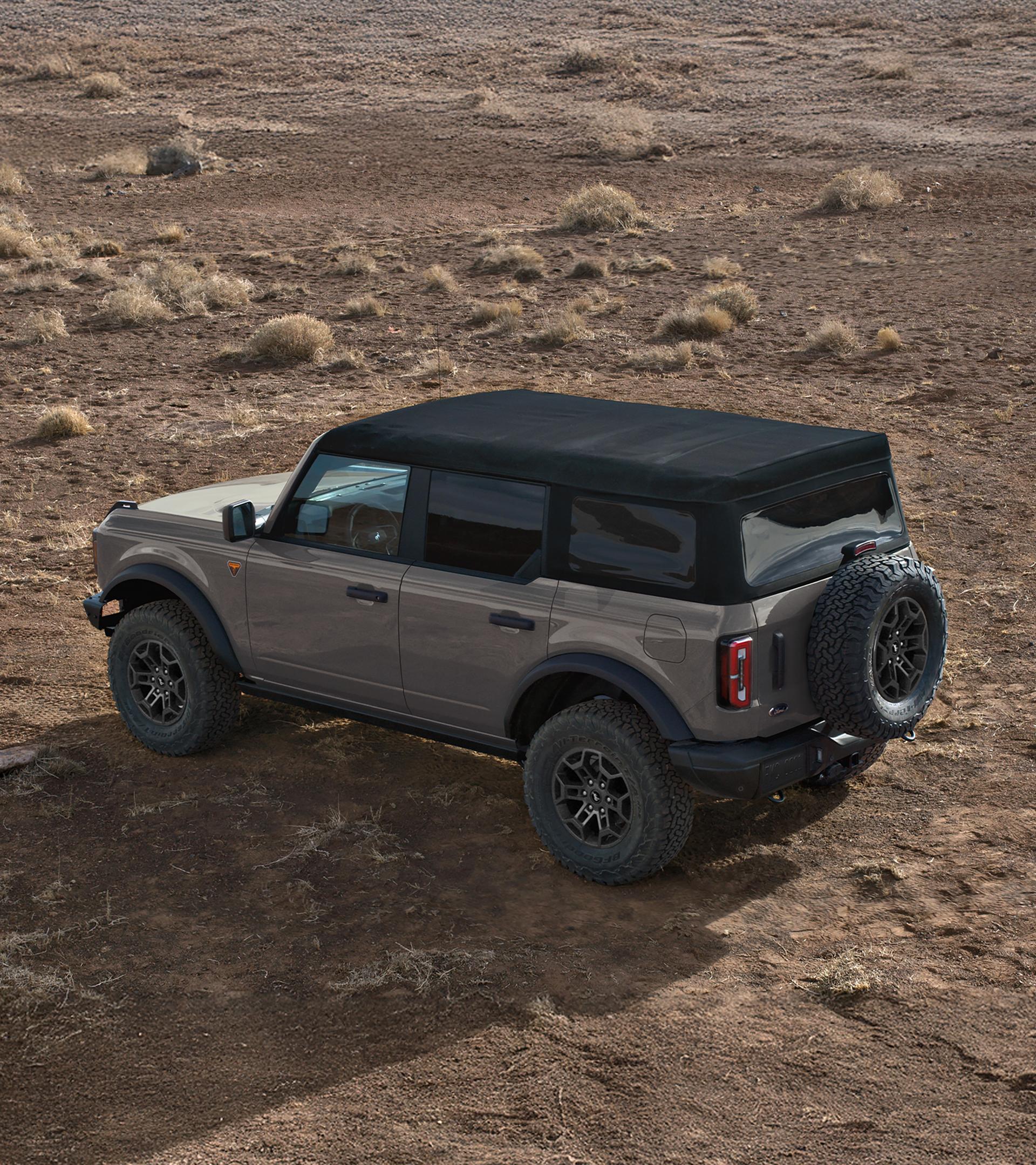 A 2026 Ford Bronco® SUV with the soft top folded back / the hard top removed