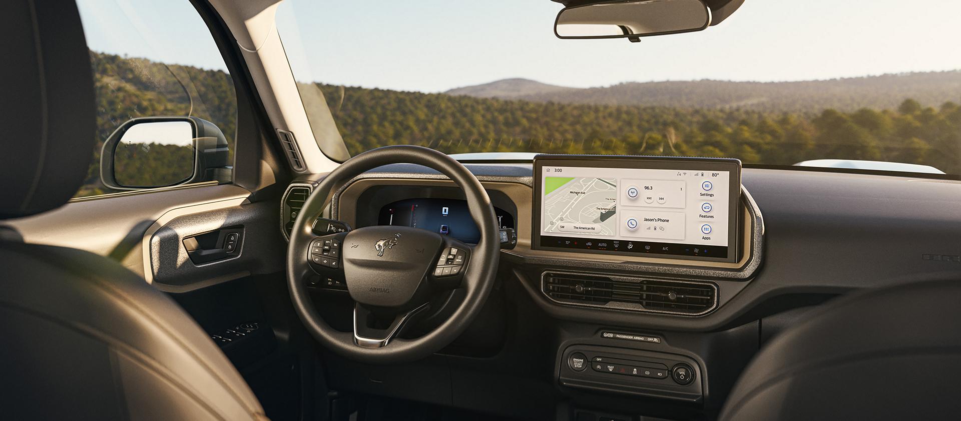 A 2026 Ford Bronco Sport® SUV interior showing the centre display, steering wheel, and driver's seat