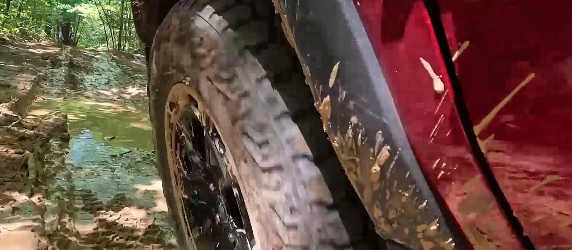 A 2026 Ford Bronco Sport® SUV being driven through a forest