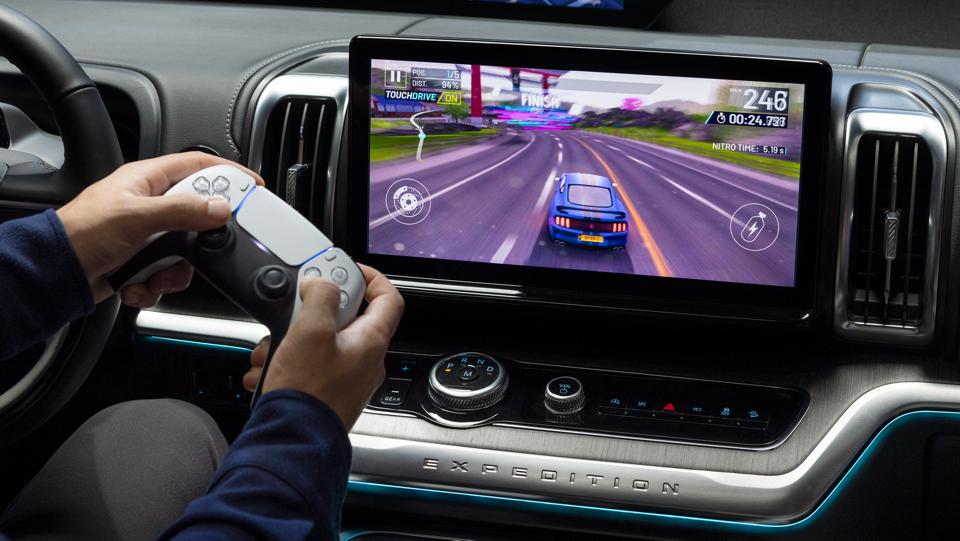 Parked 2026 Ford Expedition® SUV 13.2-inch centre display with driver playing a video game