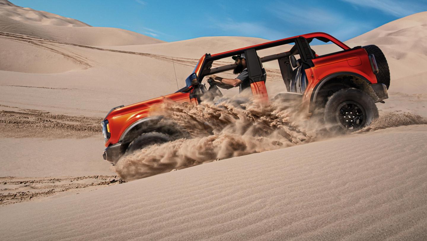 Bronco off-roading through the desert.