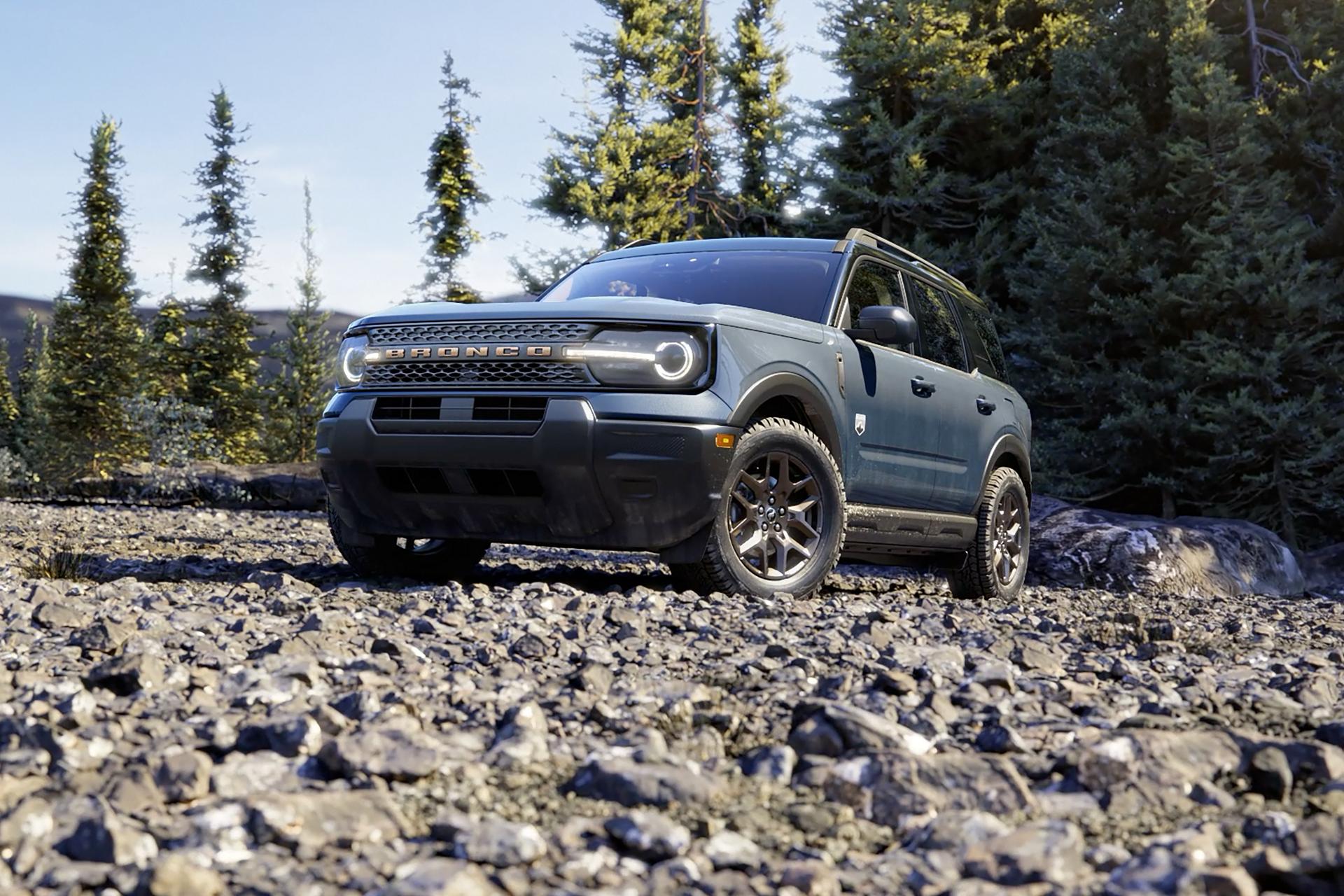 2026 Ford Bronco Sport® SUV parked in the woods with trees surrounding the vehicle
