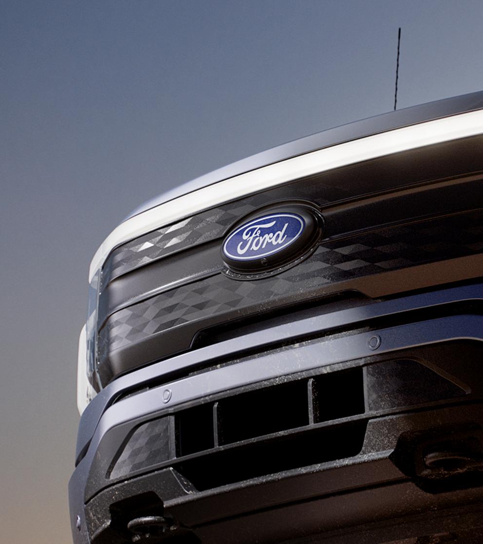 Front view of an F-150 Lightning grille with light bar on.
