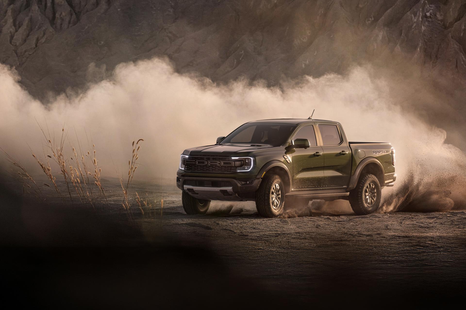 2026 Ford Ranger Raptor® truck driving with speed through a desert