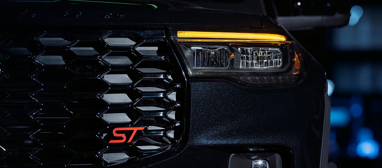 The 2027 Ford Explorer® ST with the available Sinister Package, showing the amber daytime running lights illuminated