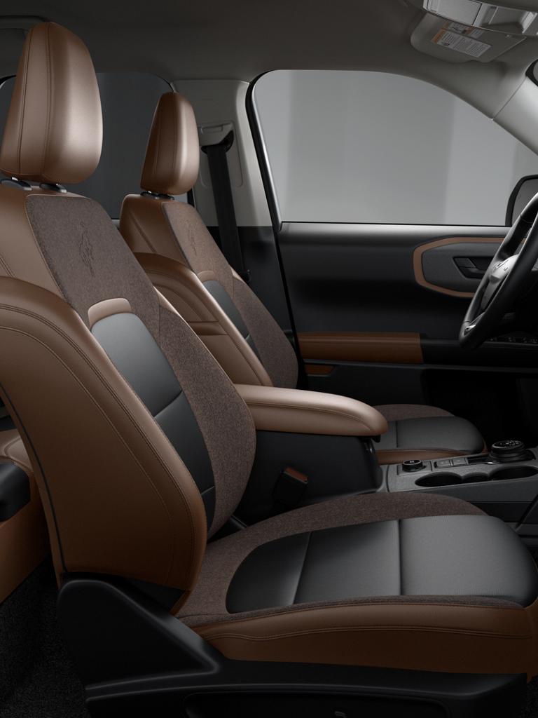 Interior of the 2026 Ford Bronco Sport® Outer Banks® model shown in premium-trimmed seating materials