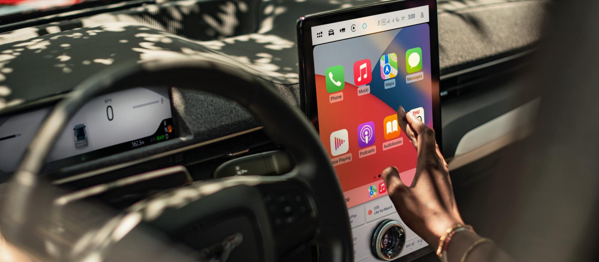 Steering wheel and touchscreen in a 2025 Ford Mustang Mach-E®