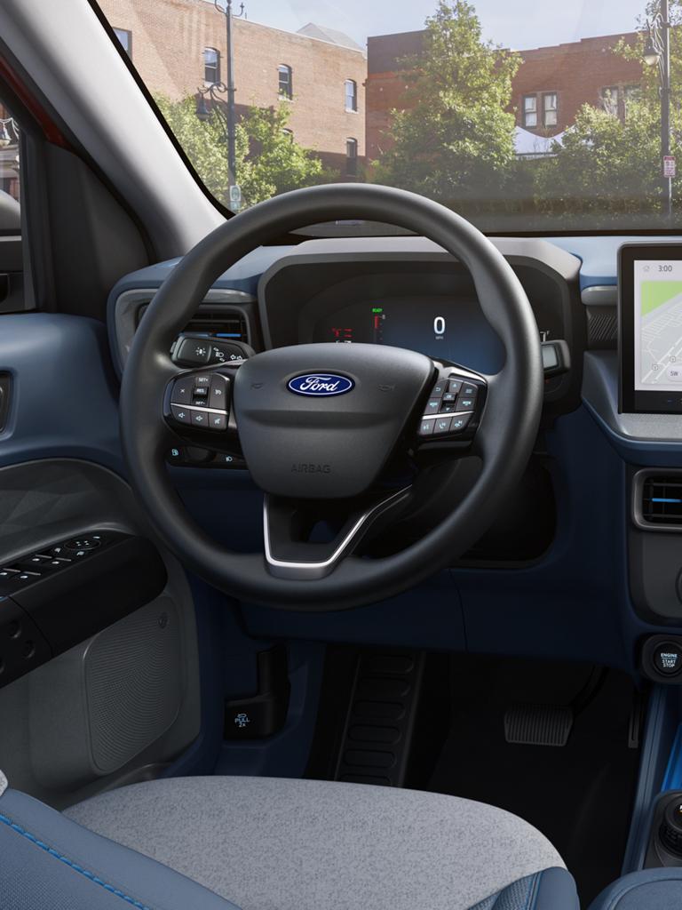 The dashboard of a 2026 Ford Maverick® pickup, showing the touchscreen and digital cluster