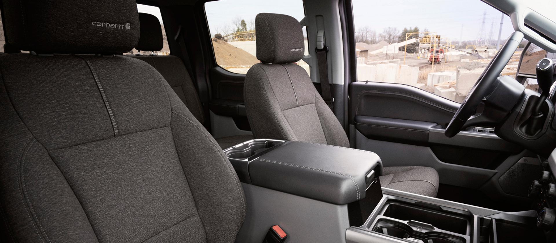 Front seats view inside the 2027 Ford Super Duty® F-350® XLT with the Super Duty Carhartt® Package