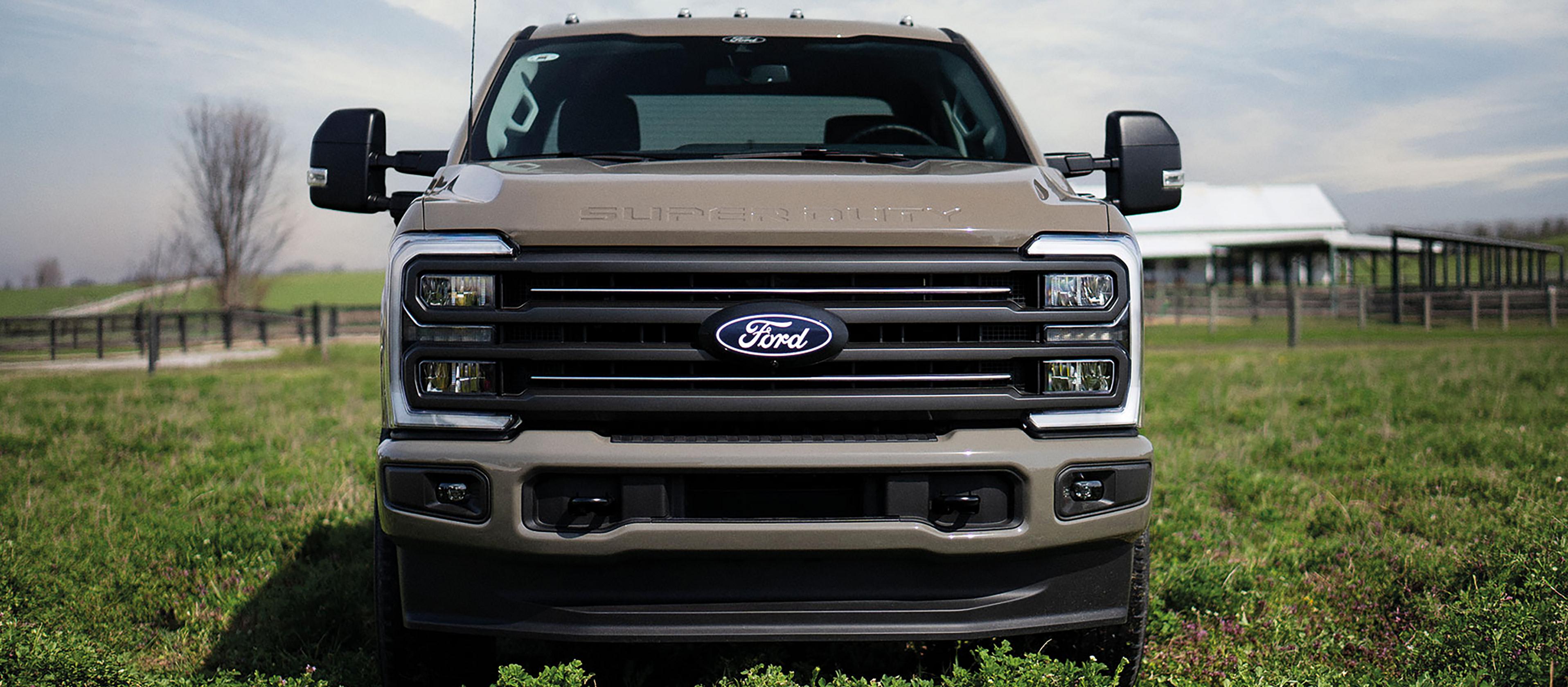2027 Ford Super Duty® F-250® XLT model with the Super Duty Carhartt® Package parked in a grassy field