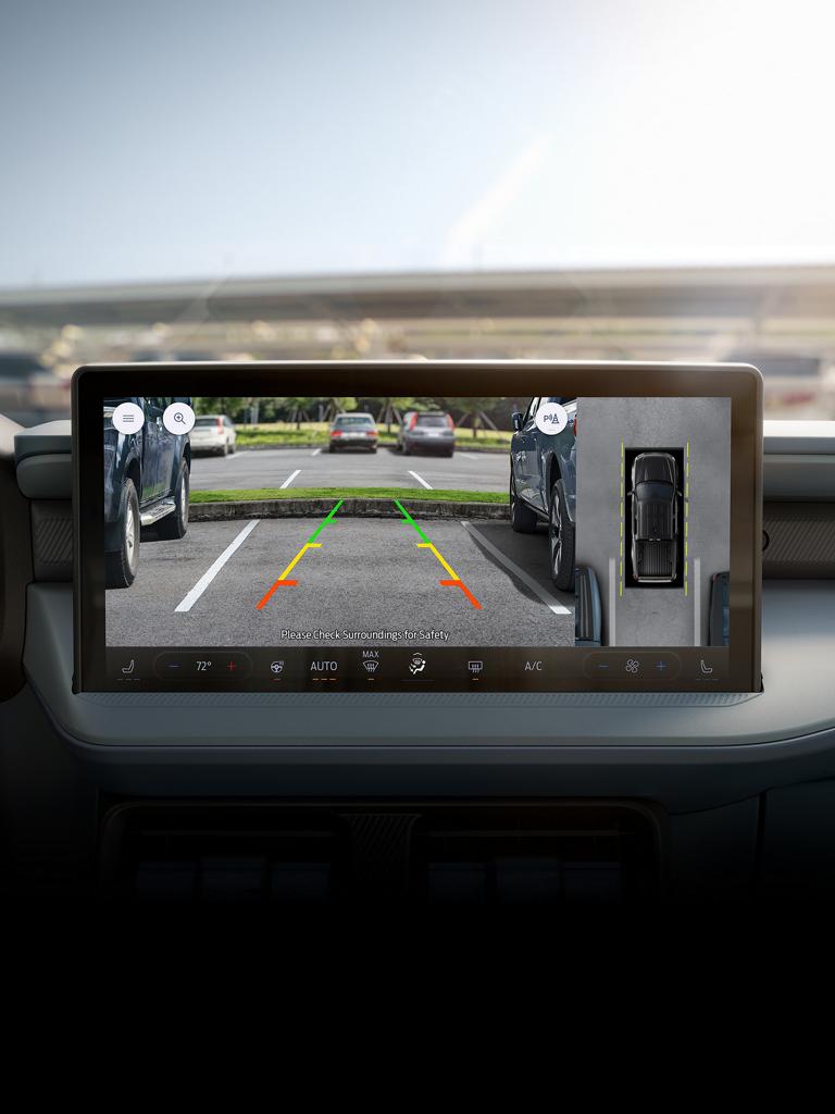 Close-up of the centre display screen showing the rear camera view