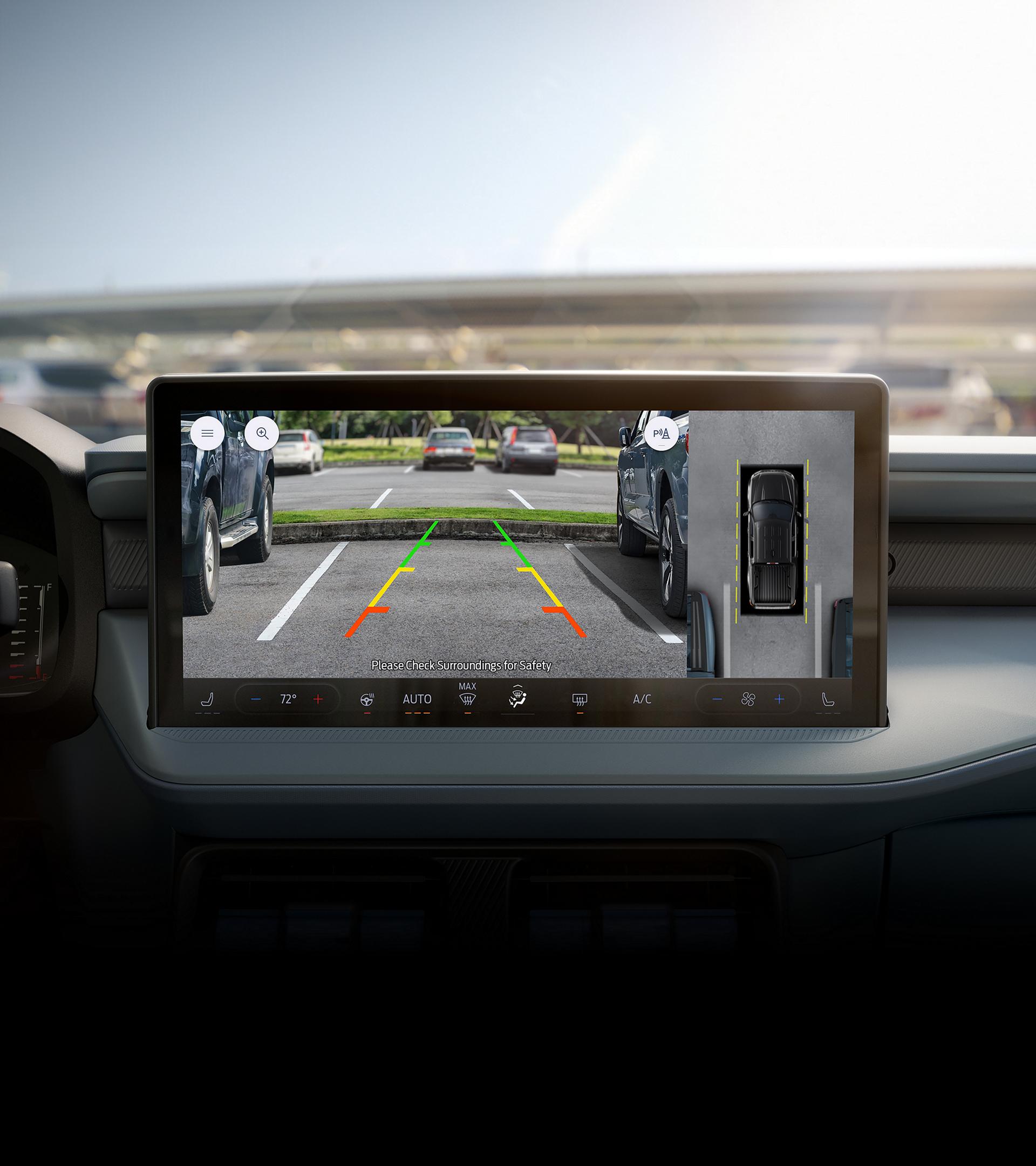 Close-up of the 13.2" centre display showing reverse camera view