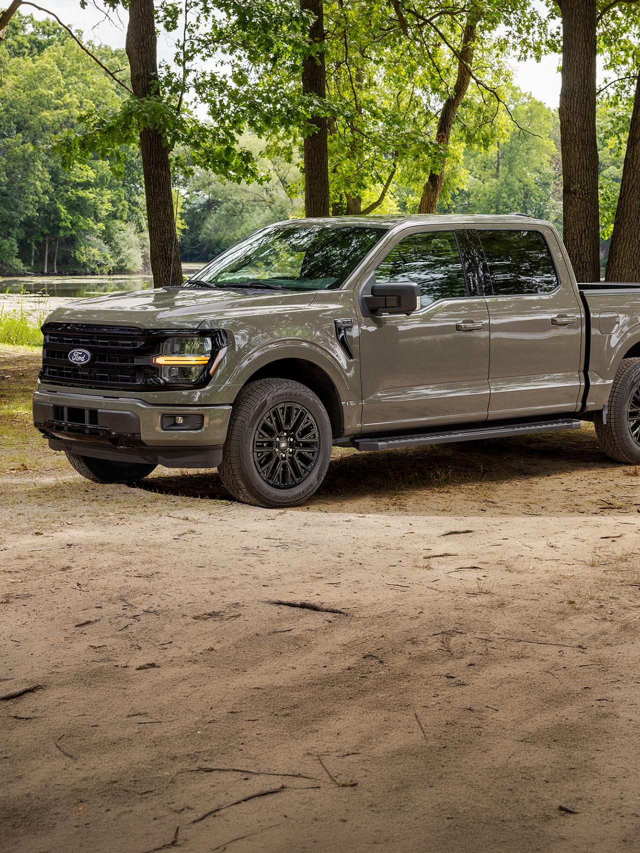 2027 Ford F-150® XLT pickup parked in a wooded area