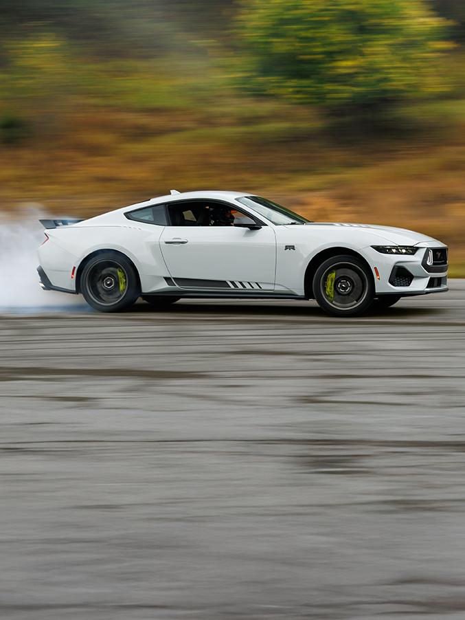 Mustang RTR driving on a road.
