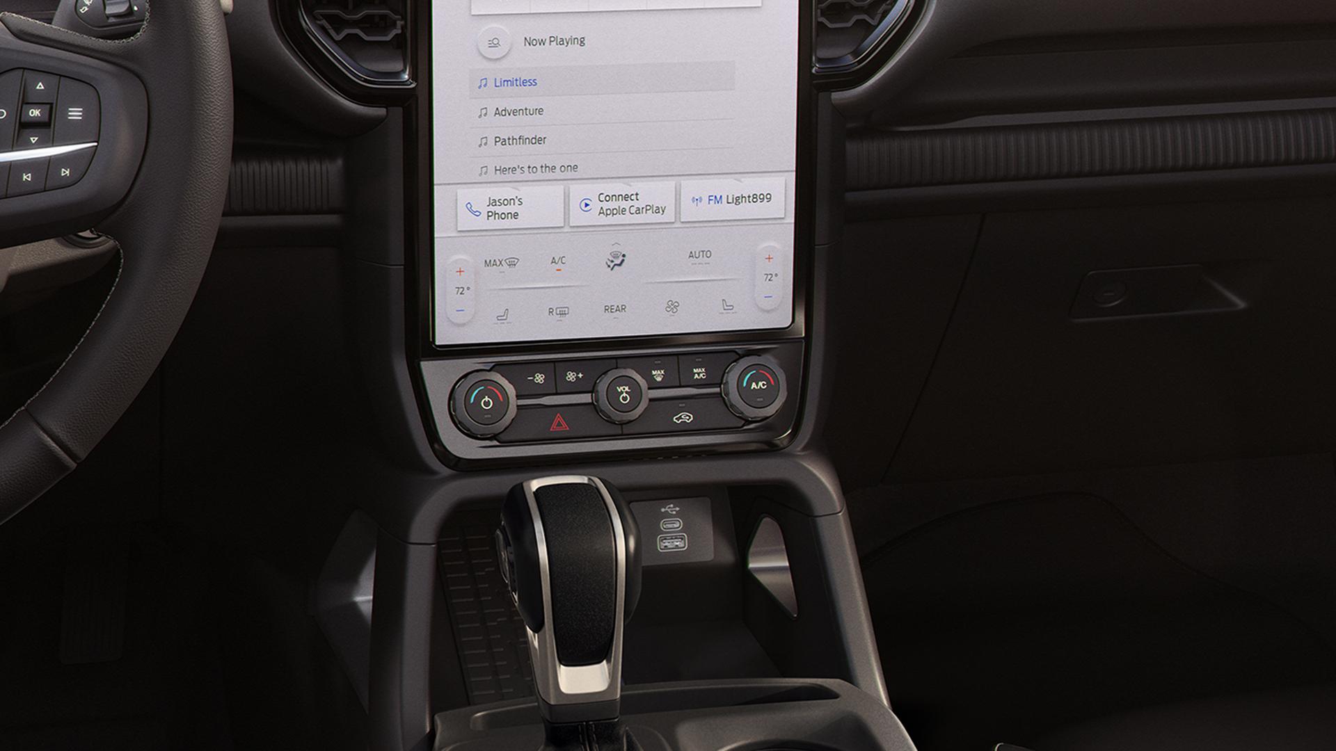 Interior view highlighting the centre display and dual-zone electronic climate control feature