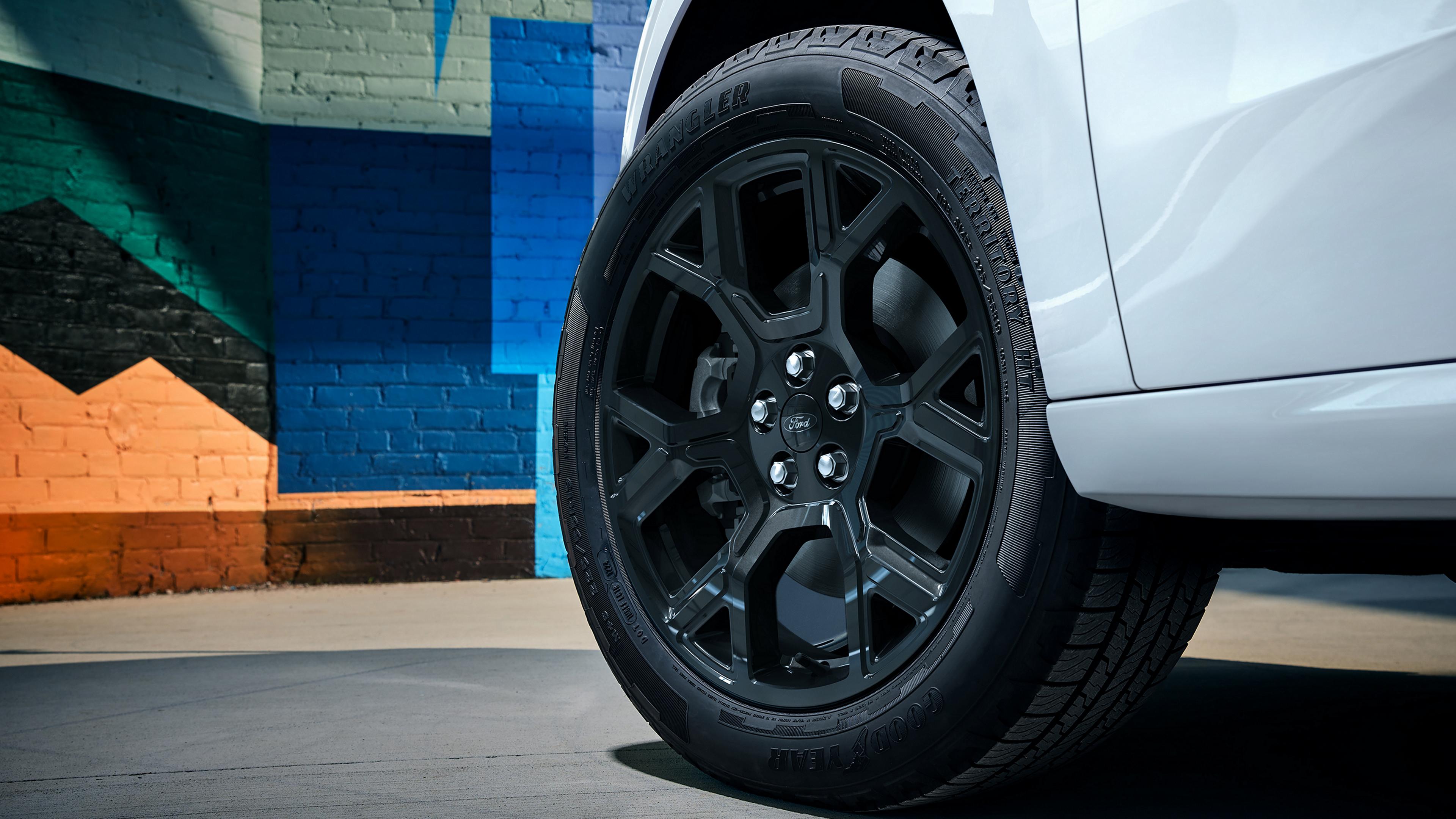 Close-up of the black 19-inch gloss black-painted wheel on a 2026 Ford Maverick® Lobo™ pickup