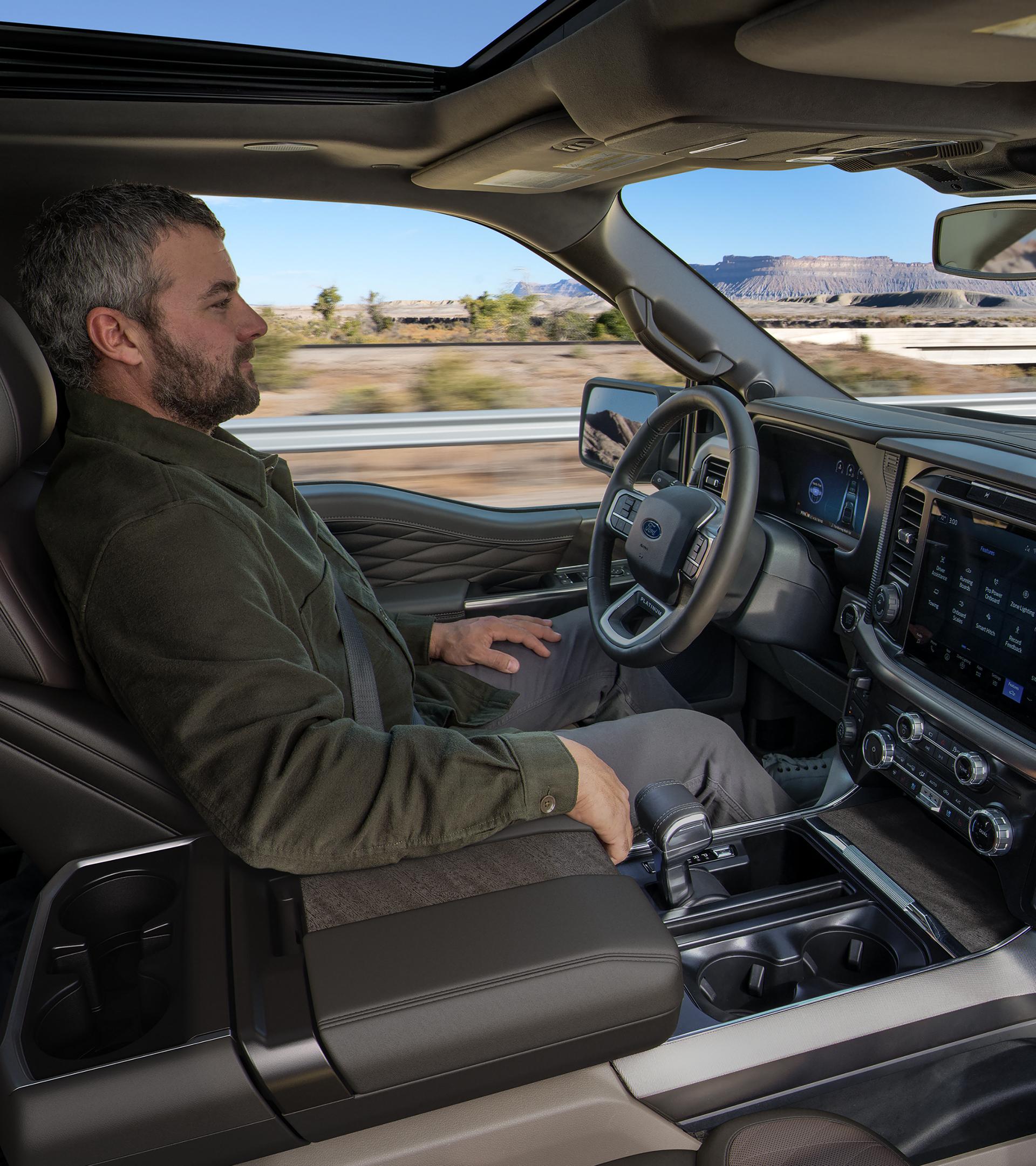 Person using the Ford BlueCruise hands-free driving feature on a 2025 Ford F-150® pickup