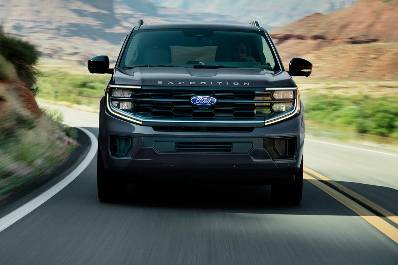 2027 Ford Expedition® MAX Platinum™ SUV being driven on a highway