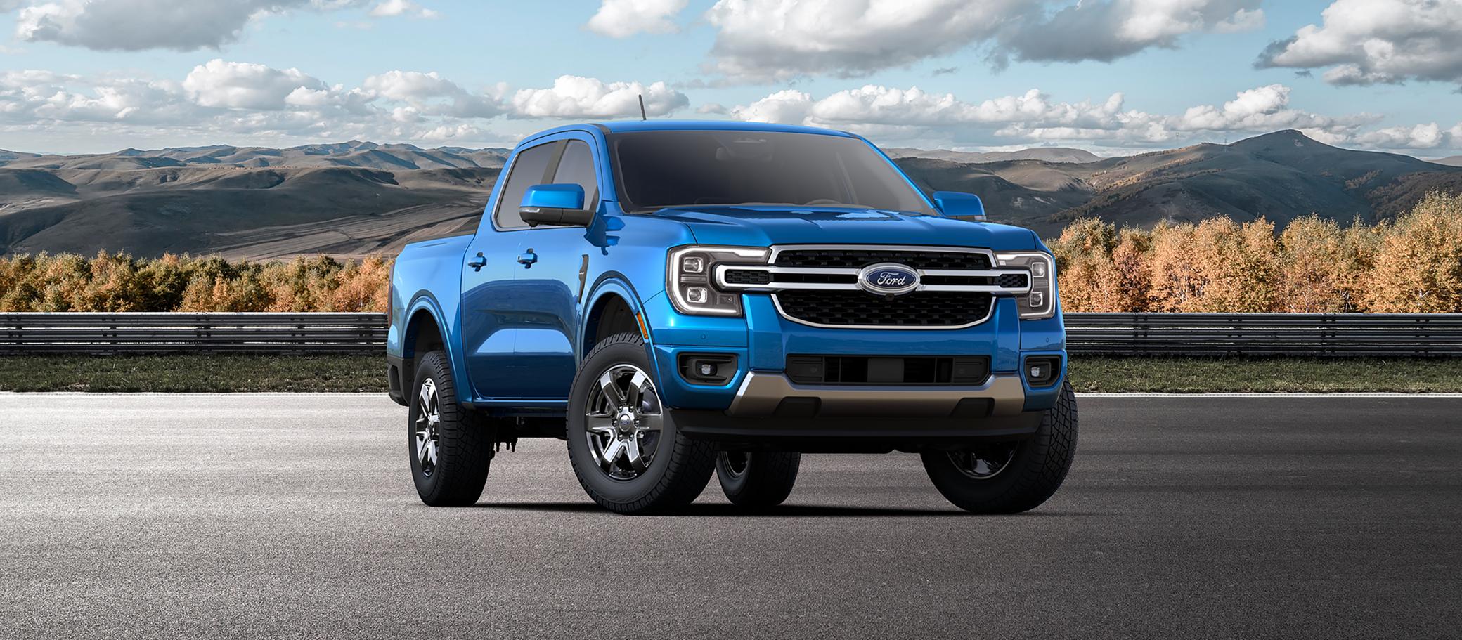 A 2025 Ford Ranger® with available Chrome Accent Package parked on the road with a mountainous background